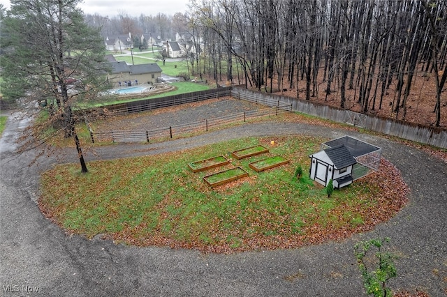 view of community with an outbuilding