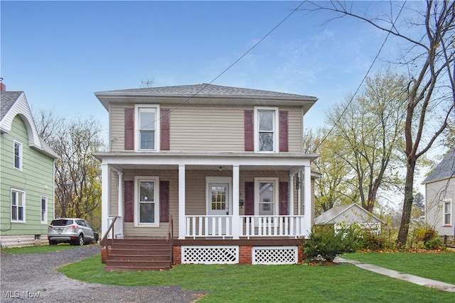 view of front of home featuring a front yard