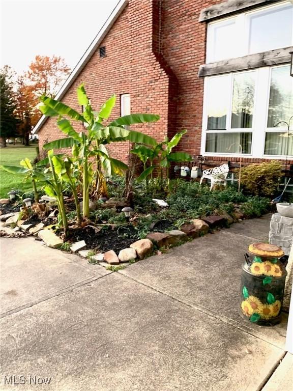 view of home's exterior with a patio area