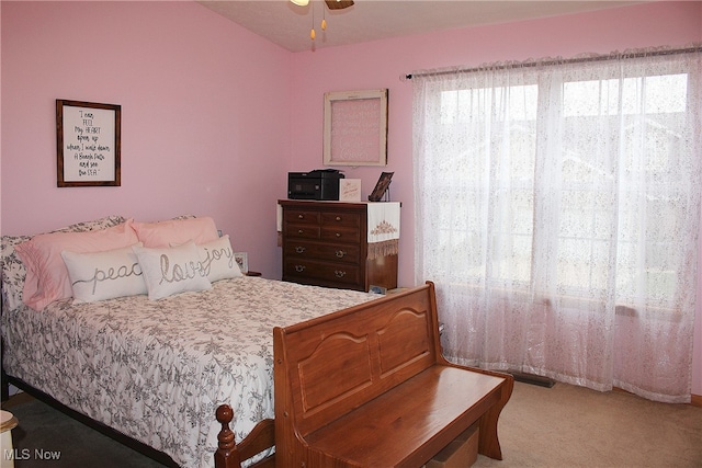 carpeted bedroom featuring ceiling fan