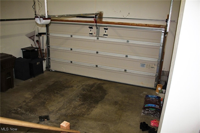 garage featuring a garage door opener