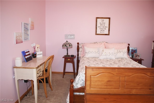 bedroom with light carpet