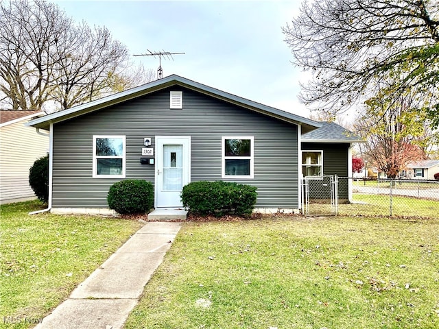 view of front of home with a front yard