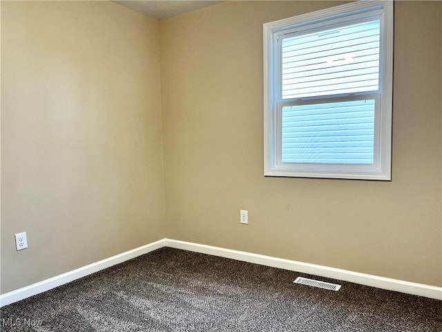 view of carpeted spare room