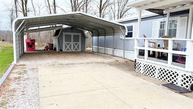 view of parking / parking lot featuring a carport