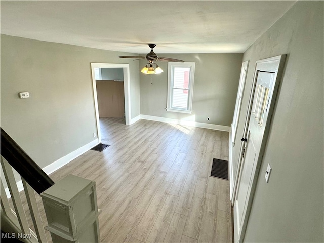 spare room with ceiling fan and light hardwood / wood-style flooring