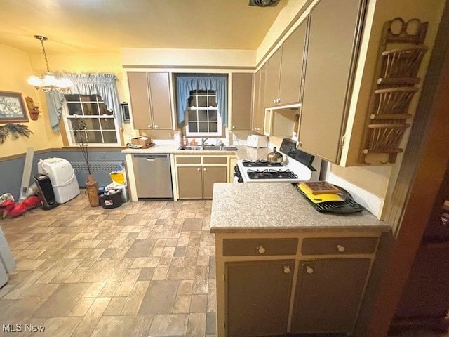 kitchen with sink, an inviting chandelier, stainless steel dishwasher, decorative light fixtures, and white range with gas cooktop