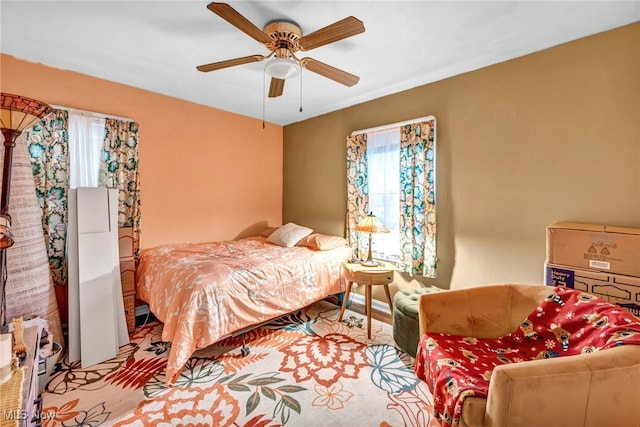 bedroom featuring ceiling fan