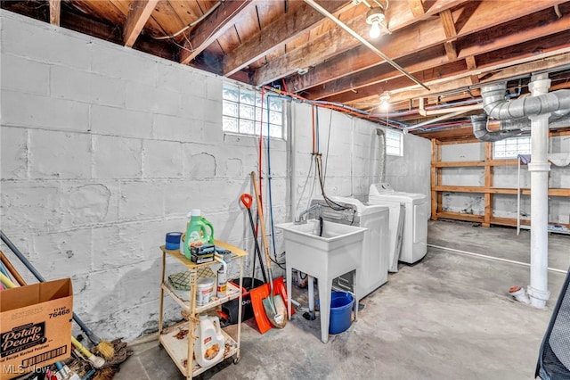 basement with washing machine and dryer