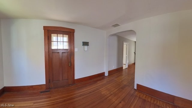 entrance foyer featuring dark hardwood / wood-style floors