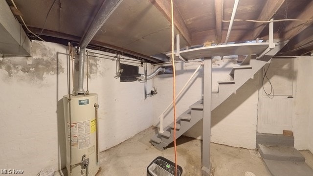 basement featuring gas water heater