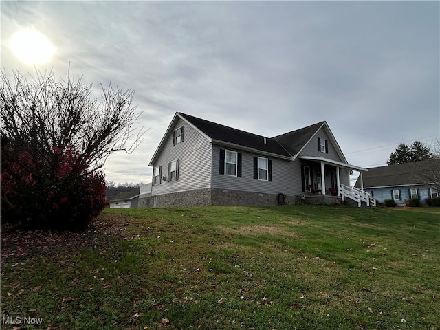 exterior space with a porch and a front lawn