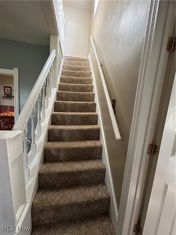 stairway with carpet flooring