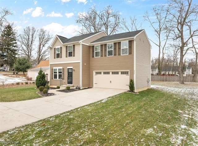 view of front facade featuring a front yard and a garage