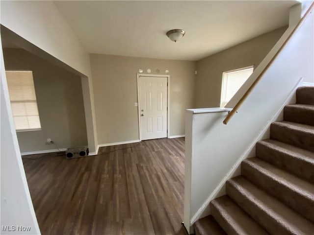 interior space with dark hardwood / wood-style floors