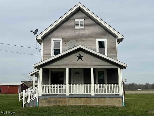 view of front facade featuring a porch and a front lawn