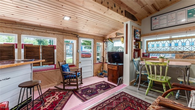 interior space featuring wood ceiling and lofted ceiling