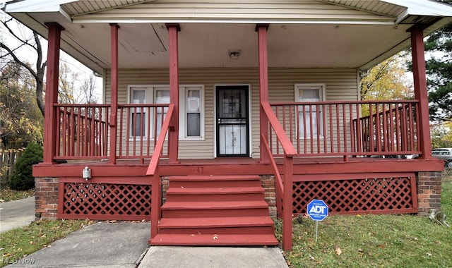 wooden terrace with a porch