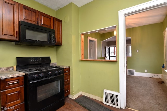 kitchen with black appliances