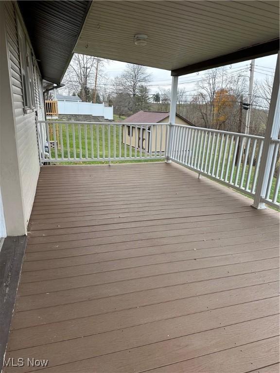 wooden terrace with covered porch