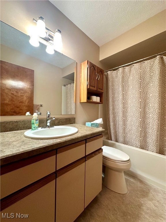 full bathroom with shower / bath combo, vanity, a textured ceiling, and toilet