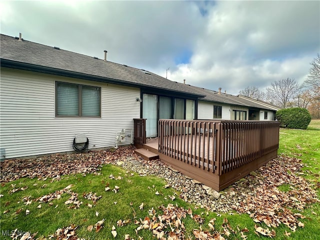 rear view of house with a deck