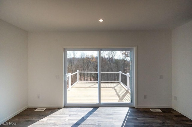 interior space with dark hardwood / wood-style flooring