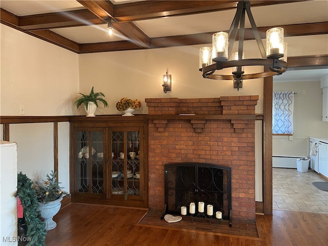 living room featuring coffered ceiling, beam ceiling, dark hardwood / wood-style flooring, and a brick fireplace