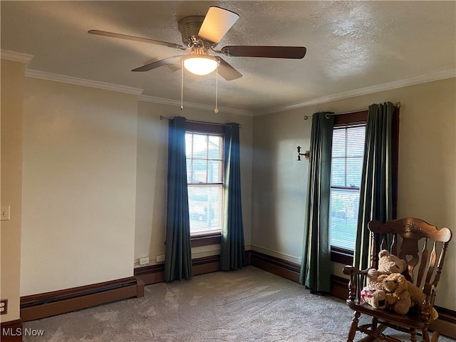 unfurnished room featuring ceiling fan, ornamental molding, a textured ceiling, a baseboard radiator, and light colored carpet