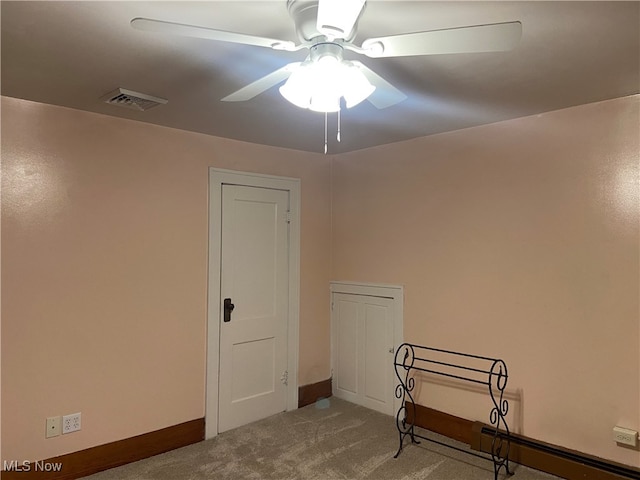 unfurnished room featuring carpet flooring and ceiling fan