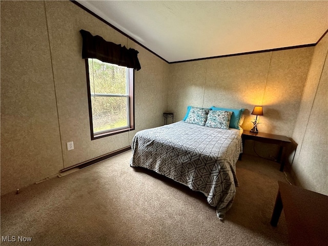 carpeted bedroom featuring ornamental molding, a textured ceiling, and lofted ceiling