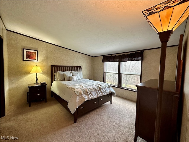 bedroom with carpet flooring, ornamental molding, and a textured ceiling