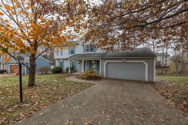 view of front property with a front yard and a garage