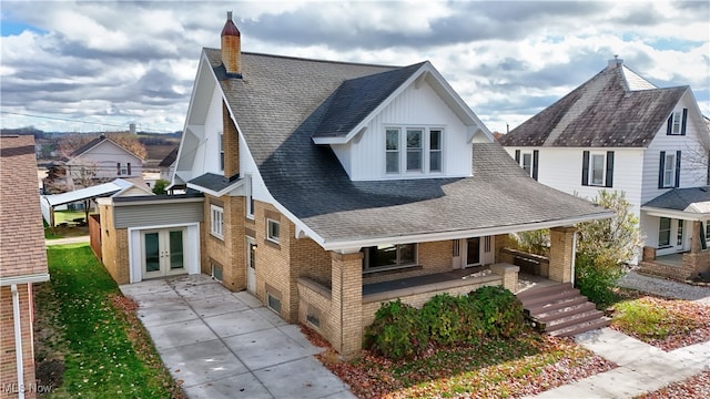 view of front of house with french doors and a porch