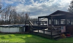 exterior space featuring a swimming pool side deck