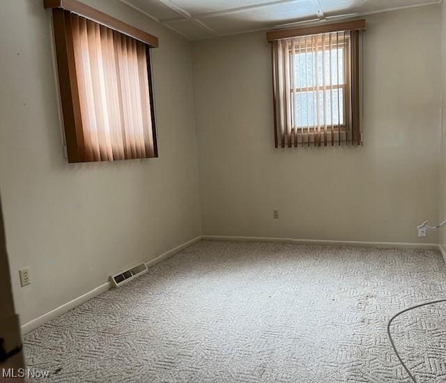 view of carpeted spare room