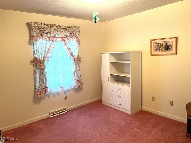 unfurnished bedroom featuring carpet flooring