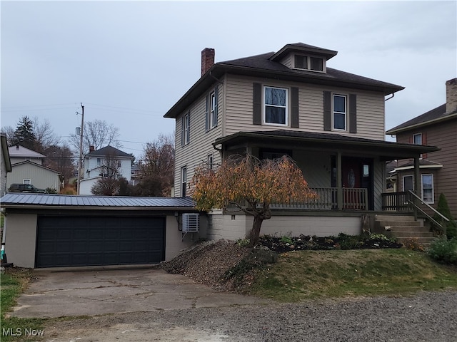 front facade featuring a porch and a garage