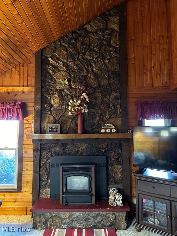 interior details featuring wooden walls and wood ceiling