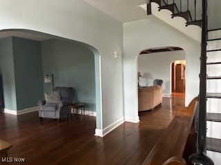 hall featuring dark wood-type flooring