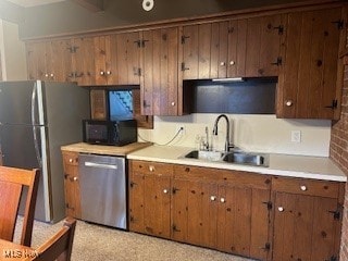 kitchen featuring sink and stainless steel appliances