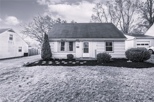 view of front of property with a front lawn