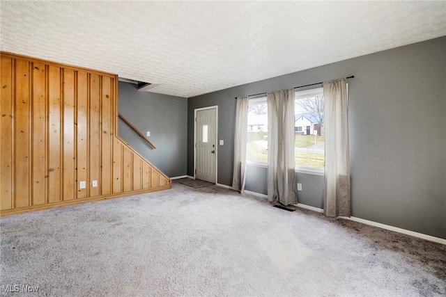 interior space featuring a textured ceiling