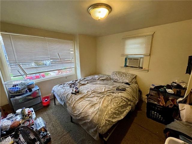 bedroom with carpet floors and cooling unit