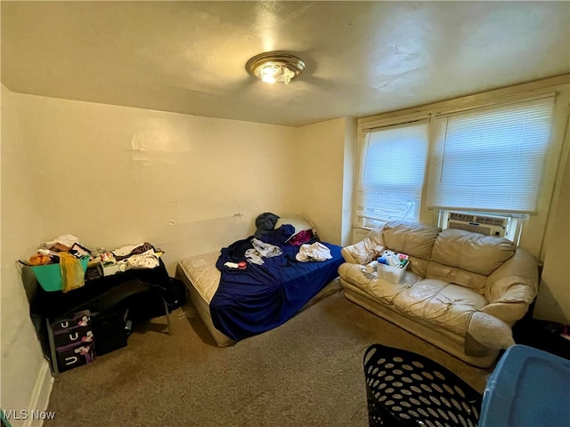 bedroom with carpet and cooling unit