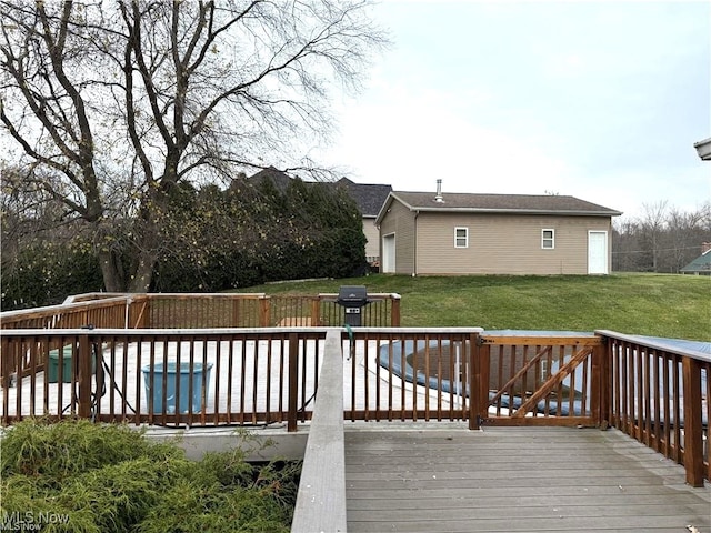 deck featuring a yard