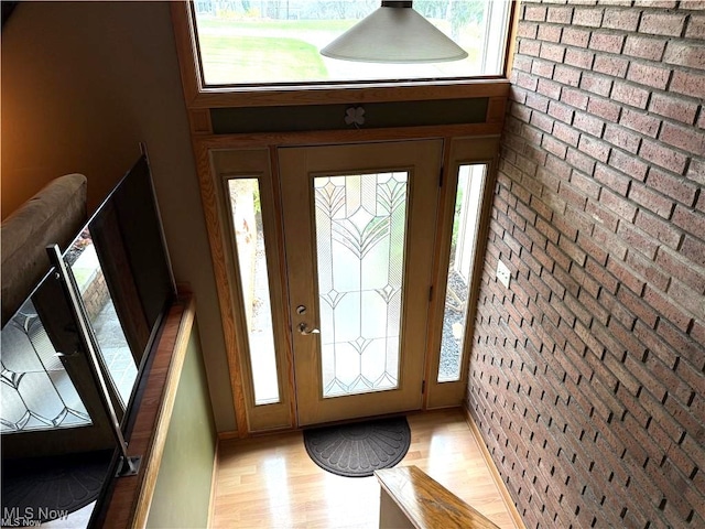 entryway with light hardwood / wood-style flooring