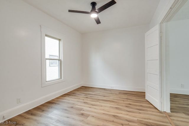 spare room with ceiling fan and light hardwood / wood-style flooring