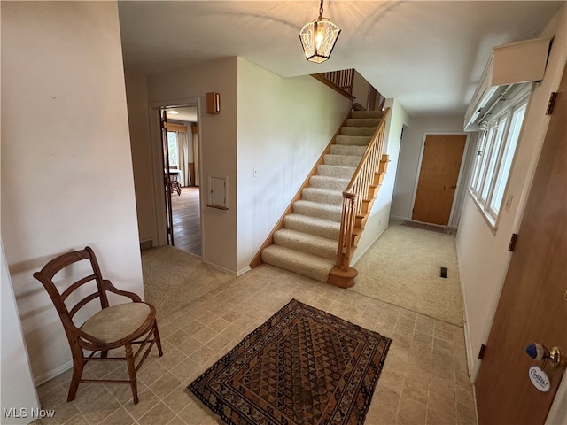 stairway with carpet flooring