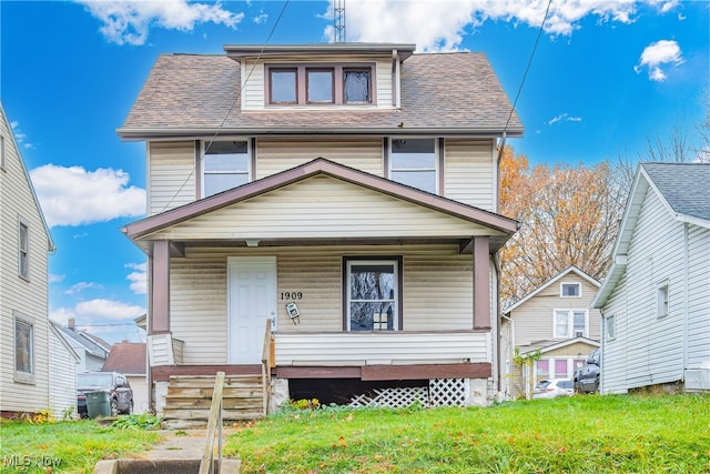 view of front of property featuring covered porch